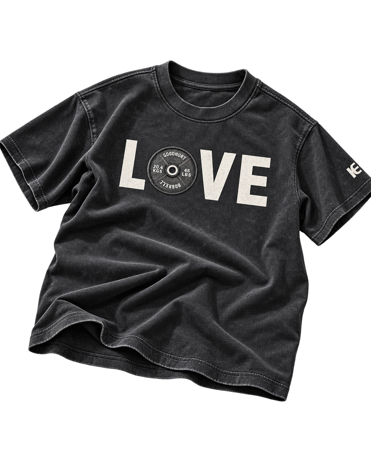 A washed black short-sleeve t-shirt with a distressed graphic on the chest spelling 'LOVE' in white, with a central circular graphic containing the text 'VETERANS ONLY'. A small white graphic is printed on the right sleeve.