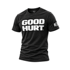 A heather black crewneck t-shirt featuring the words 'GOOD HURT' printed in bold white capital letters across the chest, with a small white logo on the right sleeve.