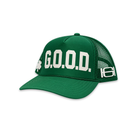 A green trucker-style cap with a curved brim, featuring G.O.O.D.

