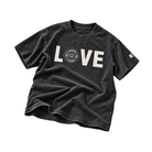 A washed black short-sleeve t-shirt with a distressed graphic on the chest spelling 'LOVE' in white, with a central circular graphic containing the text 'VETERANS ONLY'. A small white graphic is printed on the right sleeve.