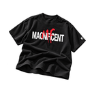 A black short-sleeve t-shirt with a graphic print on the front reading 'MAGNIFICENT' in white and red, styled with a drape on a plain white background.