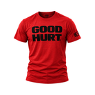 A red short-sleeve crewneck t-shirt with 'GOOD HURT' printed in bold black letters across the chest, and a black logo on the right sleeve, shown against a plain white background.